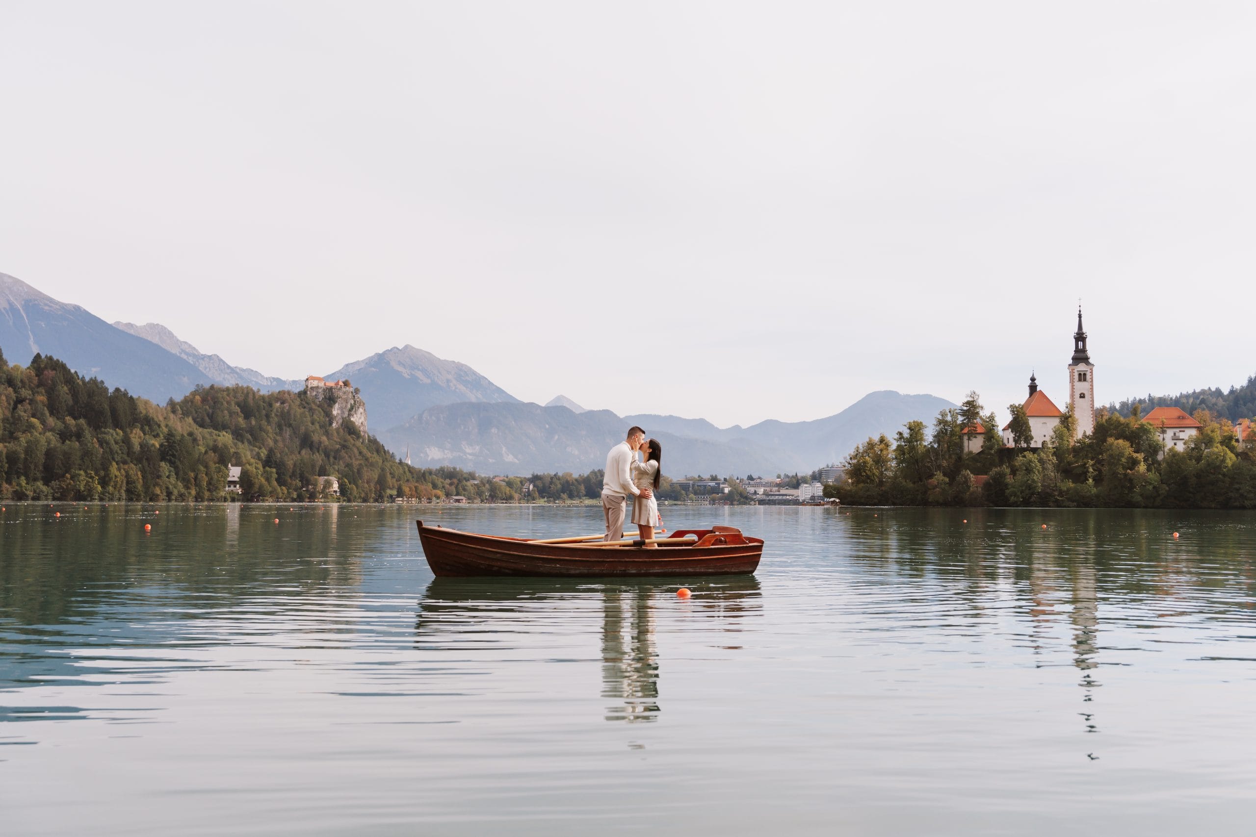 "g Photographer Couple engagement photoshoot in Bled, Slovenia with a magical backdrop"