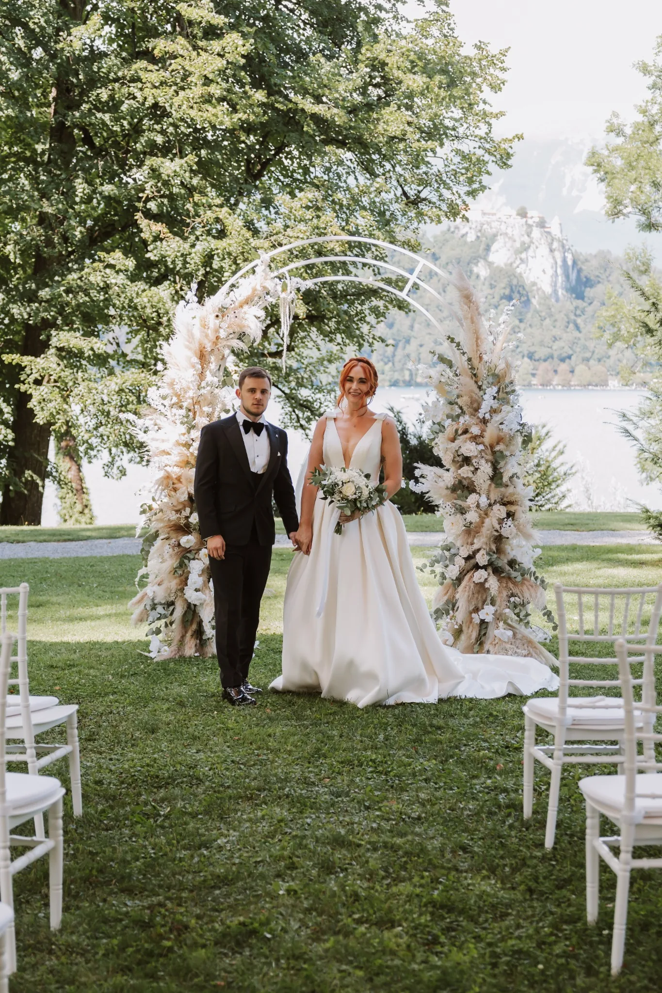 Newlyweds after their outdoor wedding ceremony at Vila Bled